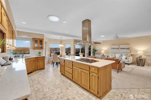 How many cooks can you assemble in this kitchen? Gas cooktop, all the counter and prep space you need to create a feast for family and friends.