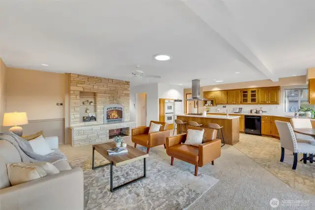 Family room kitchen and eating nook create an entertain zone you're sure to love.  Access to a wrap around patio. Gas fireplace with a sitting hearth provides the accent to the room is meant for gathering.