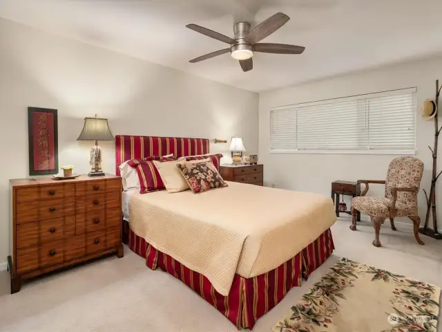 The master bedroom is a very comfortable size and has carpeting and filtered soft light.