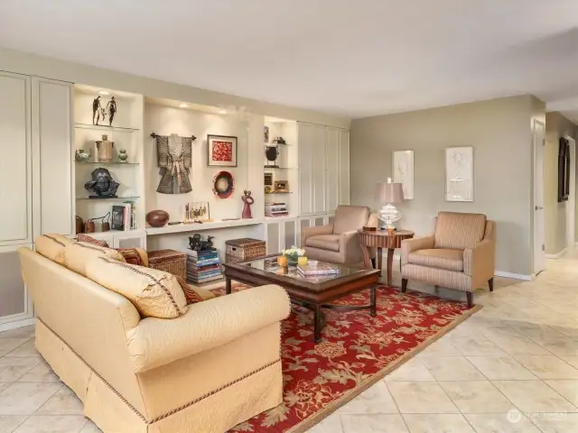 With muted wall colors, tile flooring and stunning built-ins, the Living Room is very inviting.