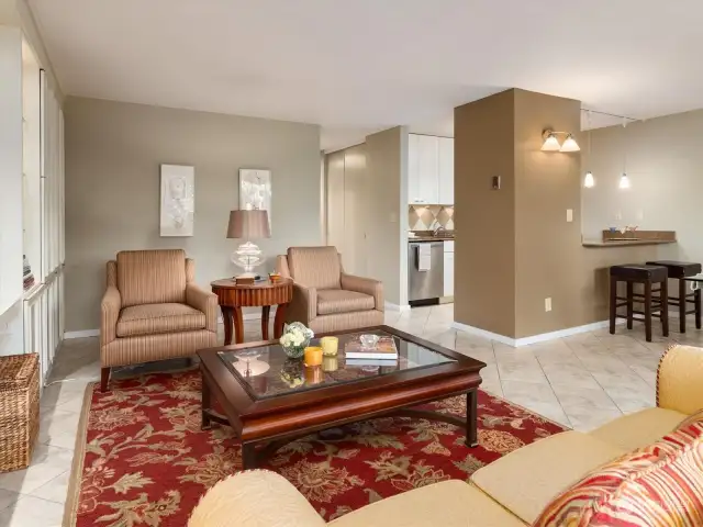 The open layout makes this condo perfect, with the Living Room opening up to the Kitchen and Dining Room.