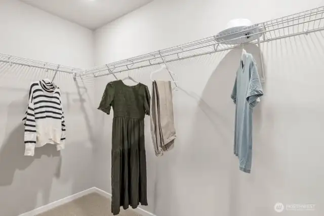 Primary walk-in closet. Pictures are representative of Burnham floorplan. Colors and options will vary. Photos from Model Home on 30.