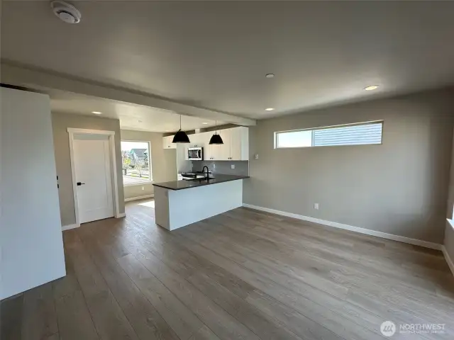 Great room with door to left leading to powder room