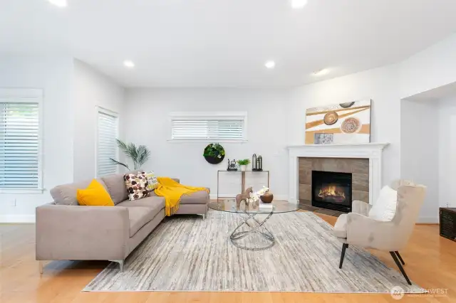 Generous family room features gas fireplace.
