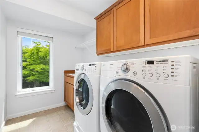 Spacious Laundry room with sink upstairs
