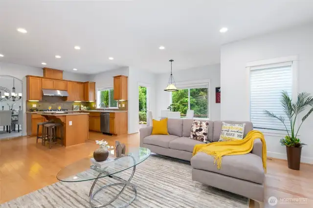 Gleaming maple hardwood floor extends from foyer to powder room, family room to kitchen and nook.