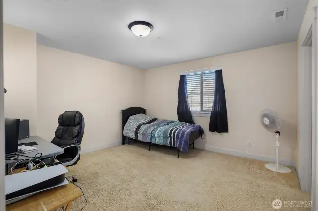 Guest bedroom #1 with walk-in closet.