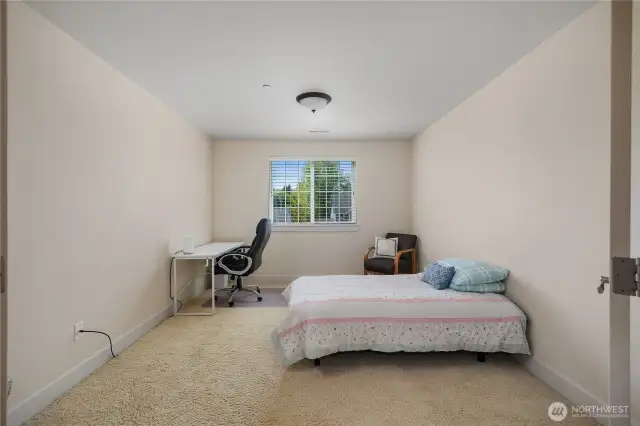 Upstairs French doors lead to bonus/media room.  Currently used as a guest bedroom.