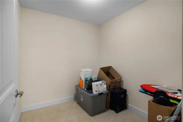 Upstairs is an oversized storage room/closet.