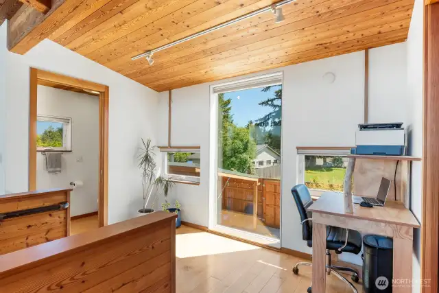 Engineered hardwood Maple flooring all throughout upstairs living.