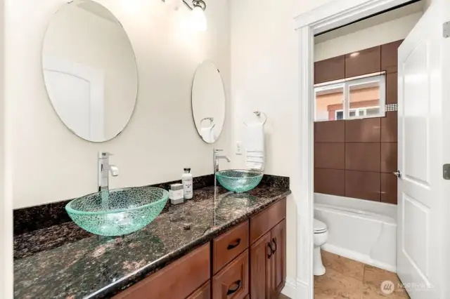 Beautiful hallway bathroom with the tub and high quality finishes.
