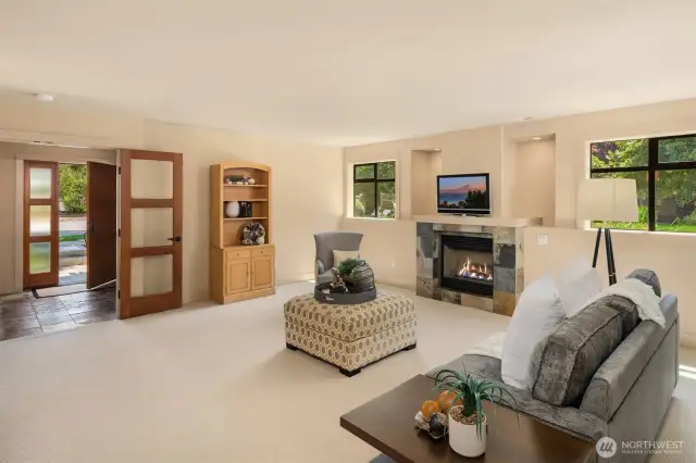 On the lower level, upon entering the home, French doors lead to the bonus room.  This room could easily be your 3rd bedroom or guest suite, or office, or any combo of all the above!