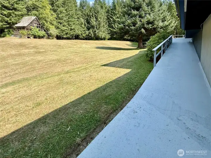 Ramp from grounds to upper level great room.