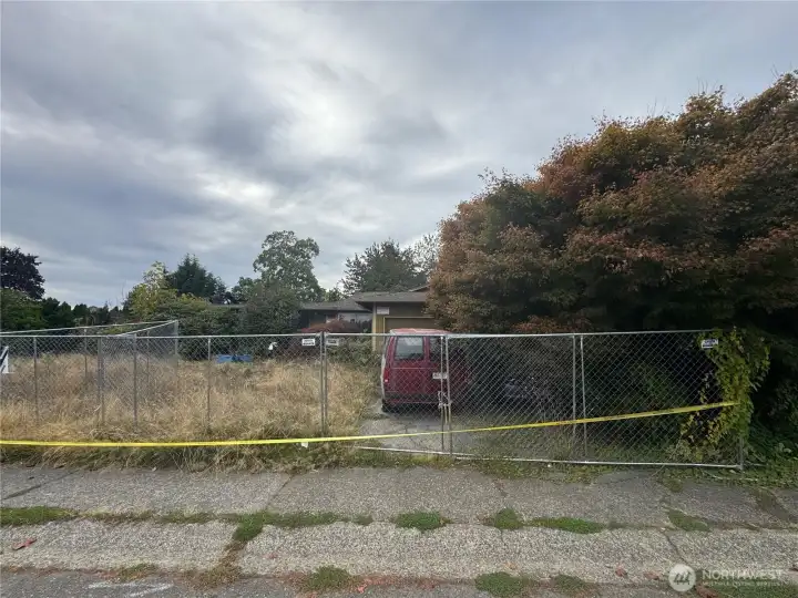 Opportunity awaits in the sought-after Fairwood Greens neighborhood! This spacious lot offers a rare chance to create your dream home in a well-established neighborhood surrounded by mature trees and quality homes. The previous residence was lost to fire, leaving remnants of the original structure — ideal for buyers or builders ready to reimagine the space from the ground up. Utilities are already on-site, simplifying the rebuild process. Enjoy a peaceful, suburban setting with nearby parks, schools, shopping, and convenient commuter access. Whether you’re an investor or a homeowner with a vision, this property is your blank canvas to bring new life to a desirable Renton location.