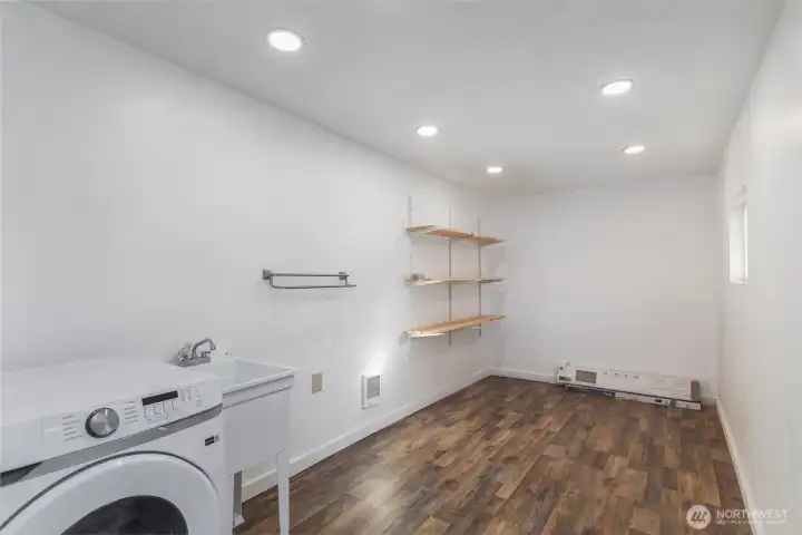 Large shed in back yard with full utility hookups