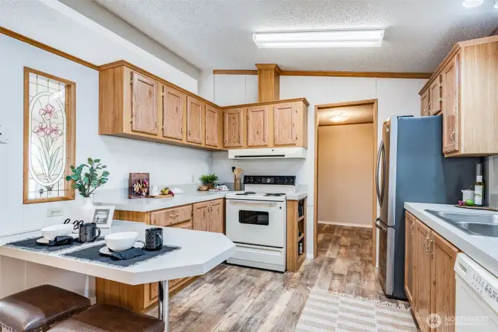 The large kitchen has handy breakfast bar!
