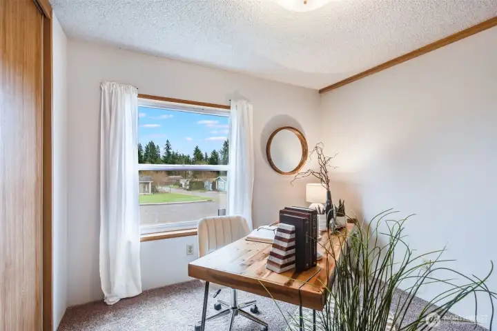 Enjoy plenty of natural daylight in this third bedroom.