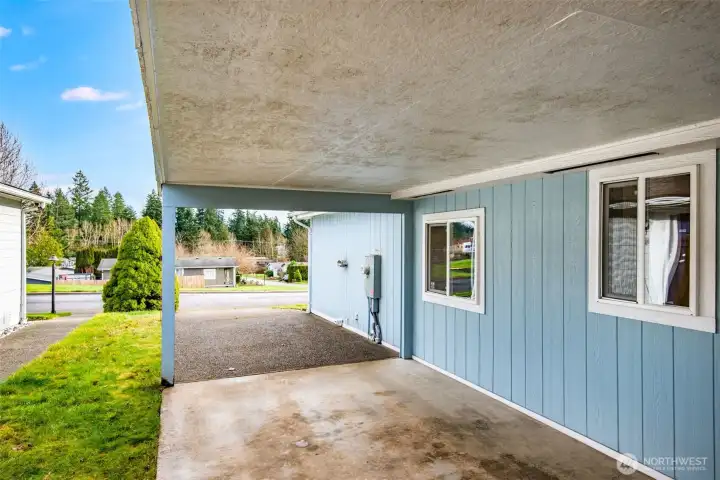 Another view of the carport and driveway.