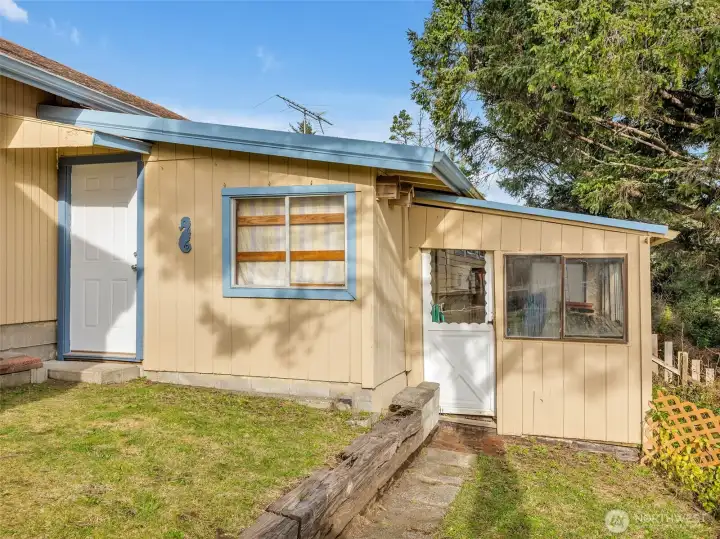 The green house off the back of the garage.