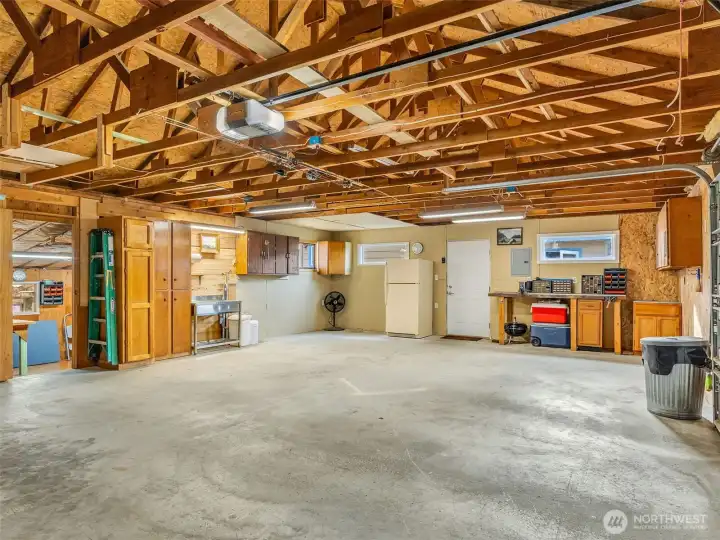 Large two car garage with work space.