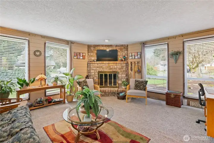 Family room with wood burning fireplace