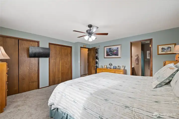 Primary bedroom with attached bathroom