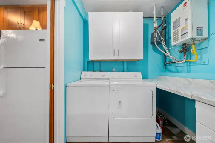 Laundry room with a laundry chute from upstairs!