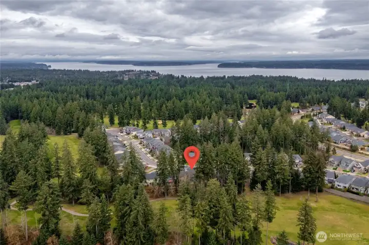 Backs to one of two professional golf courses and is minutes from the Puget Sound for boating, fishing, crabbing, and more—while still conveniently close to restaurants, shopping, and I-5 access.