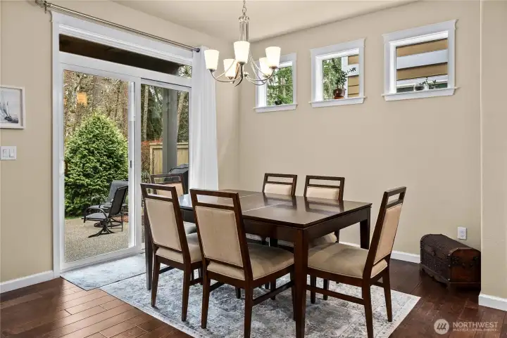 Bright dining area with easy access to the backyard patio—perfect for everyday meals and entertaining.