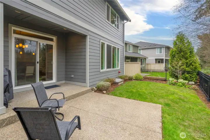 Easy-to-maintain backyard with peaceful Pacific Northwest surroundings and beautiful golf course views.