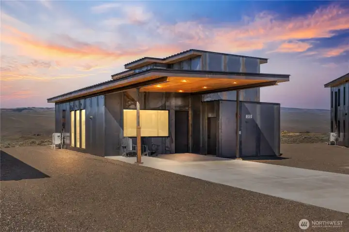 Front of home facing West with LOTS of parking.