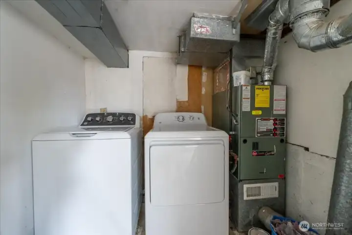Shared laundry room and shared storage space.
