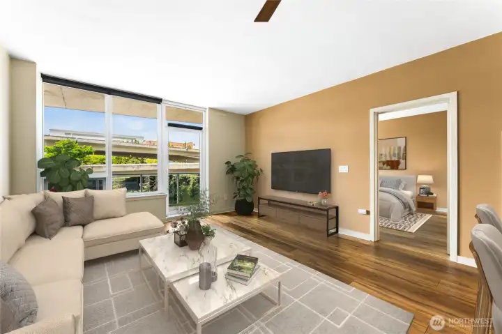 The expansive living room windows frame the virbrant city views, even more dynamic after dark.