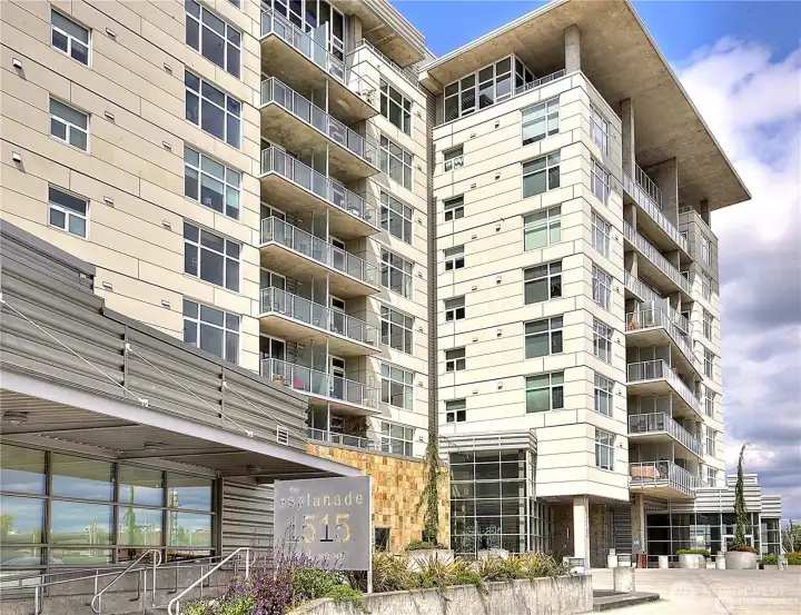 Welcome to your new home at the Esplanade. The front lobby entrance is shown to the right of center in this photo.