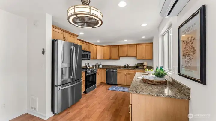 Kitchen with new stainless steel appliances. Kitchen with new stainless steel appliances.