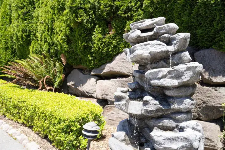 Stone & water feature at the front of home. Stone & water feature at the front of home.
