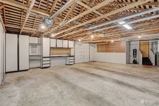 3 car garage, built-ins galore and a drive through door in the back!