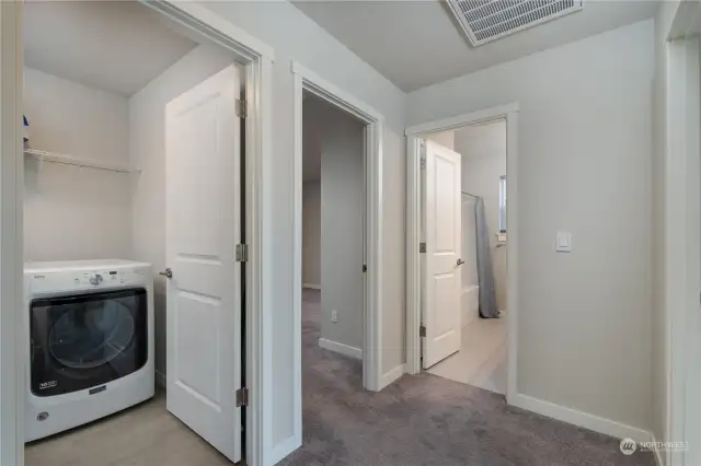 Laundry Room Conveniently Located Near Bedrooms