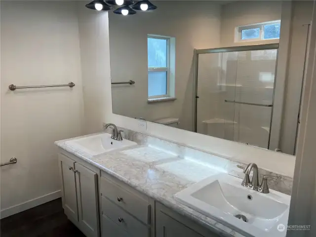 Primary bath with double vanities.