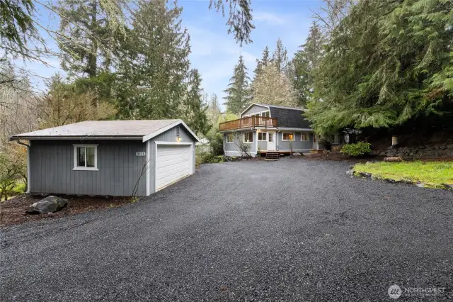 Enjoy the detached Garage and Wrap Around Driveway