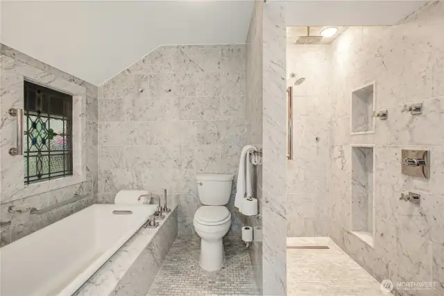 Bath is 100% White Marble with heated floors throughout…