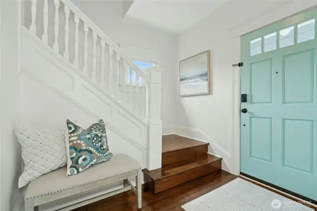 The entryway; the bottom stair riser hides a secret drawer.