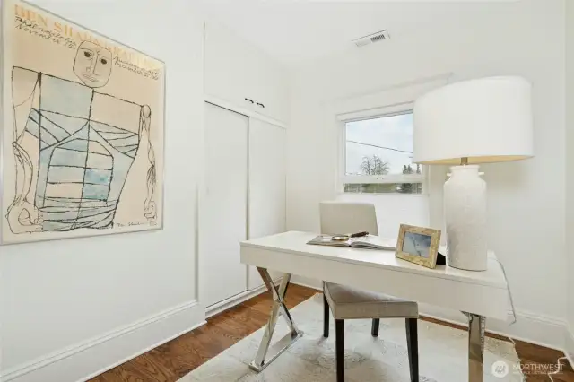 The 2nd floor bathroom has storage and plenty of space.