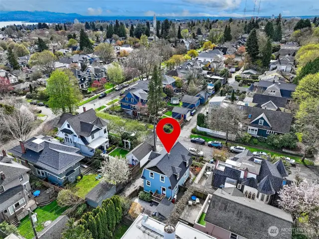 Note how this well proportioned home is set amongst beautifully restored and maintained homes. Looking southeast towards Lake Washington, St Joe's parish.