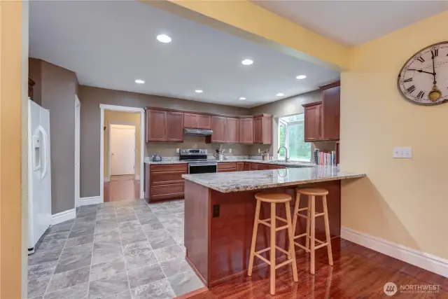 Kitchen with granite countertops.