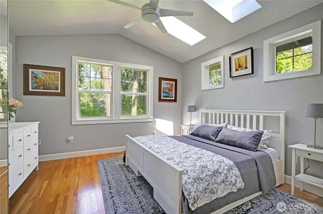 Enjoy the vaulted ceilings and open space in the primary bedroom.