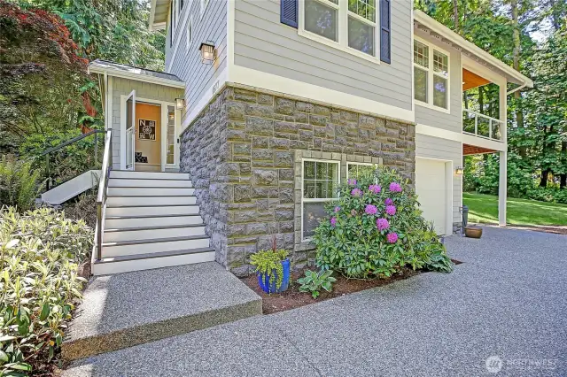Enjoy the mature landscaping which provides a nice curb appeal leading into the home.