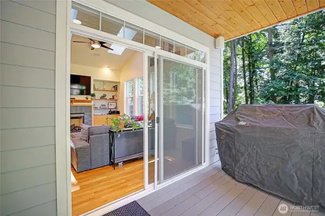 Covered patio has built in speakers and located right off the main floor living and dining room.
