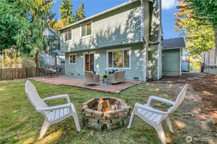 Firepit in the backyard and sideyard is also flat