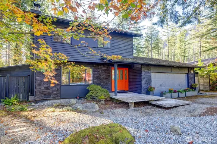 Mid-century modern style floating concrete front patio.